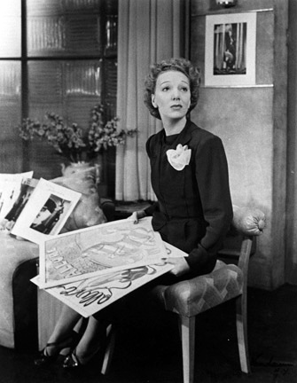 Gertrude Lawrence as Liza Elliott in the original Broadway production of LADY IN THE DARK, 1941. Liza can’t decide which cover to choose for the next issue of Allure Magazine. Gertrude Lawrence as Liza Elliott in the original Broadway production of LADY IN THE DARK, 1941. Liza can’t decide which cover to choose for the next issue of Allure Magazine.