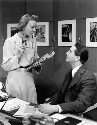 Gertrude Lawrence as Liza Elliott in the original Broadway production of LADY IN THE DARK, 1941. Liza and Charley Johnson (Macdonald Carey) in the offices of Allure Magazine. Gertrude Lawrence as Liza Elliott in the original Broadway production of LADY IN THE DARK, 1941. Liza and Charley Johnson (Macdonald Carey) in the offices of Allure Magazine.